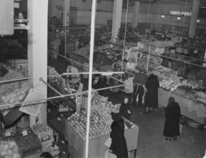 Vendors inside the newly built Essex Street Market -- courtesy of NYC Municipal Archives - Lower East Side History Project